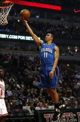 CHICAGO - FEBRUARY 24:  Courtney Lee #11 of the Orlando Magic drives for a shot attempt against the Chicago Bulls at the United Center on Feberuary 24, 2009 in Chicago, Illinois.  NOTE TO USER: User expressly acknowledges and agreees that, by downloading 