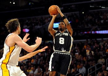 LOS ANGELES, CA - JANUARY 25:  Roger Mason #8 of the San Antonio Spurs shoots the ball over Pau Gasol #16 of the Los Angeles Lakers during the game at the Staples Center on January 25, 2009 in Los Angeles, California.  The Lakers defeated the Spurs 99-85.
