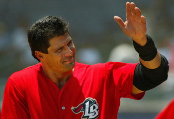 LONG BEACH, CA - JULY 16: Jose Canseco #33 of the Long Beach Armada waves to the crowd during the Golden Baseball League game against the Fullerton Flyers on July 16, 2006 at Blair Field in Long Beach, California. (Photo By Christian Petersen/Getty Imag