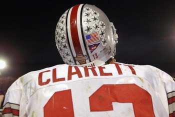 TEMPE, ARIZONA - JANUARY 3: Tailback Maurice Clarett #13 of the Ohio State Buckeyes takes in the victory over the University of Miami Hurricanes in the Tostitos Fiesta Bowl at Sun Devil Stadium on January 3, 2003 in Tempe, Arizona. Ohio State won the ga