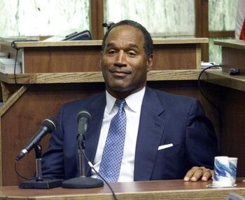 397272 06: (FILE PHOTO) Former NFL star and actor O.J. Simpson testifies in Miami-Dade County Court during his 'road rage' trial October 23, 2001 in Miami, Florida. U.S. Federal agents searched Simpson's home near Miami December 4, 2001 during an investig
