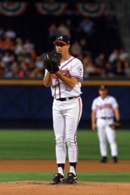 20 Oct 2001:  Greg Maddux #31 of the Atlanta Braves prepares to deliver a pitch against the Arizona Diamondbacks in the first inning of game four of the National League Championship Series at Turner Field in Atlanta, Georgia. DIGITAL IMAGE: Mandatory Cred