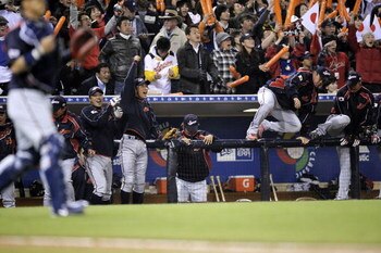 SAN DIEGO - MARCH 18: The Japanese bench celebrates after defeating Cuba 5-0 during the 2009 World Baseball Classic Round 2 Pool 1 Game 5 on March 18, 2009 at Petco Park in San Diego, California.  (Photo by Kevork Djansezian/Getty Images)