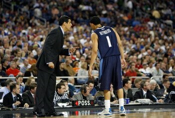 DETROIT - MARCH 28:  Head coach Jay Wright of the Villanova Wildcats talks with Scottie Reynolds against the Kansas Jayhawks during the Midwest Regional Semifinal of the 2008 NCAA Division I Men's Basketball Tournament at Ford Field on March 28, 2008 in D