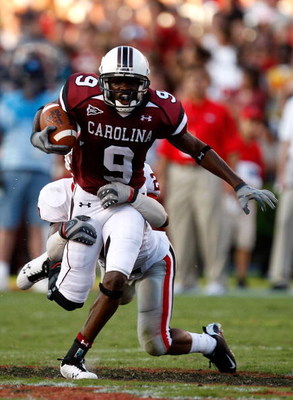 COLUMBIA, SC - SEPTEMBER 13: Asher Allen #2 of the Georgia Bulldogs tackles Moe Brown #9 of the South Carolina Gamecocks during their game September 13, 2008 at Williams-Brice Stadium in Columbia, South Carolina. (Photo by Streeter Lecka/Getty Images)