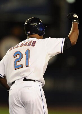 NEW YORK - SEPTEMBER 24:  Carlos Delgado #21 of the New York Mets rounds the bases after hitting a grand slam in the third inning against Carlos Zambrano #38 of the Chigago Cubs during their game at Shea Stadium on September 24, 2008 in the Queens borough