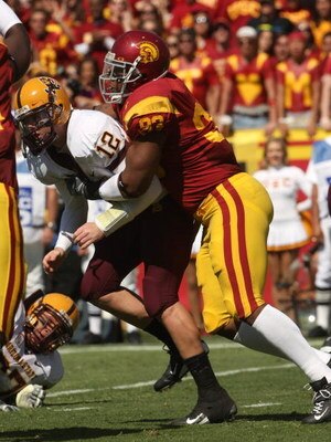 LOS ANGELES, CA - OCTOBER 11:  Defensive Everson Griffen #93 of the USC Trojans hits quarterback Rudy Johnson #12 of  the Arizona State Sun Devils on October 10, 2008 at the Los Angeles Coliseum in Los Angeles, California.  USC wond 28-0.  (Photo by Steph