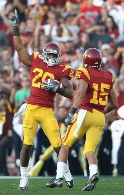 PASADENA, CA - JANUARY 01:  Safety Will Harris #26 and Kevin Thomas #15 of the USC Trojans celebrate after a fumble recovery during the 95th Rose Bowl Game against the Penn State Nittany Lions at the Rose Bowl on January 1, 2009 in Pasadena, California. T