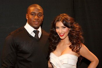 NEW YORK - FEBRUARY 16:  TV personality Kim Kardashian (right) and Reggie Bush of the New Orleans Saints pose backstage during Mercedes-Benz Fall 2009 Fashion Week at Bryant Park on February 16, 2009 in New York City.  (Photo by Thos Robinson/Getty Images