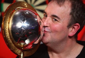 LONDON - JANUARY 04:  Phil Taylor of England celebrates winning the Final against Raymond Van Barneveld of the Netherlands during the 2009 Ladbrokes.com PDC World Darts Championship at Alexandra Palace on January 4, 2009 in London, England.  (Photo by Ian