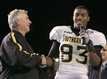 LAFAYETTE, LA - DECEMBER 20: Head coach Jeff Bower (L) congratulates New Orleans Bowl MVP Shawn Nelson #83 (R) of Southern Miss after defeating Arkansas State 31-19 after The New Orleans Bowl on December 20, 2005 at Cajun Field in Lafayette, Louisiana. T