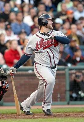 SAN FRANCISCO - JULY 23: Brian McCann #16 of the Atlanta Braves hits a three run double in the first inning against the San Francisco Giants on July 23, 2007 at AT&T Park in San Francisco, California. (Photo by Jed Jacobsohn/Getty Images)