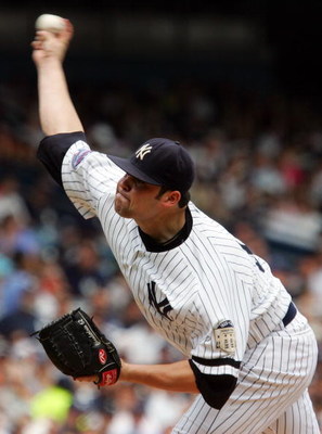 NEW YORK - JULY 30:  Joba Chamberlain #62 of the New York Yankees deals a pitch against the Baltimore Orioles on July 30, 2008 at Yankee Stadium in the Bronx borough of New York City.  (Photo by Jim McIsaac/Getty Images)