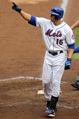 NEW YORK - SEPTEMBER 28:  Carlos Beltran #15 of the New York Mets salutes the fans after hitting a two run home run against the Florida Marlins during the last regular season baseball game ever played in Shea Stadium on September 28, 2008 in the Flushing 