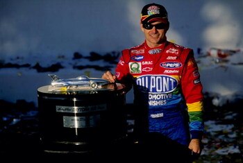 14 Feb 1999:  Jeff Gordon #24 poses with the trophy after winning the NASCAR Daytona 500 at the Daytona International Speedway in Daytona, Florida. Mandatory Credit: Jamie Squire  /Allsport