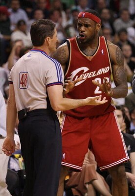 BOSTON - MAY 06:  LeBron James #23 of the Cleveland Cavaliers discusses a foul against him with referee Scott Foster #48 in the second half against the Boston Celtics during Game One of the Eastern Conference Semifinals during the 2008 NBA Playoffs on May