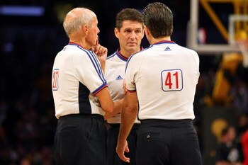 LOS ANGELES, CA - JUNE 15:  (L-R) Referees Dick  Bavetta, Scott Foster and Ken Mauer talk together in the second half  of Game Five of the 2008 NBA Finals between the Boston Celtics and the Los Angeles Lakers on June 15, 2008 at Staples Center in Los Ange