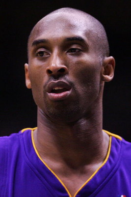 EAST RUTHERFORD, NJ - MARCH 27:  Kobe Bryant #24 of the Los Angeles Lakers looks on against the New Jersey Nets during the game on March 27, 2009 at the Izod Center in East Rutherford, New Jersey. NOTE TO USER: User expressly acknowledges and agrees that,