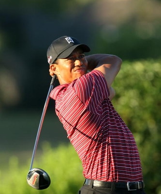 ORLANDO, FL - MARCH 29:  Tiger Woods of the USA watches his tee shot at the 16th hole during the final round of the Arnold Palmer Invitational Presented by Mastercard at the Bay Hill Club and Lodge on March 29, 2009 in Orlando, Florida  (Photo by David Ca