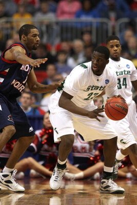 MINNEAPOLIS - MARCH 20:  Draymond Green #23 of the Michigan State Spartans looks to move the ball against the Robert Morris Colonials during the first round of the NCAA Division I Men's Basketball Tournament at the Hubert H. Humphrey Metrodome on March 20