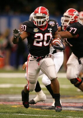 NEW ORLEANS - JANUARY 01:  Thomas Brown #20 of the Georgia Bulldogs runs the ball against the Hawai'i Warriors during the Allstate Sugar Bowl at the Louisiana Superdome on January 1, 2008 in New Orleans, Louisiana.  (Photo by Matthew Stockman/Getty Images