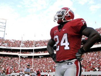 ATHENS, GA - SEPTEMBER 6: Running back Knowshon Moreno #24 of the Georgia Bulldogs checks the replay after a touchdown run against the Central Michigan Chippewas at Sanford Stadium on September 6, 2008 in Athens, Georgia.  (Photo by Al Messerschmidt/Getty