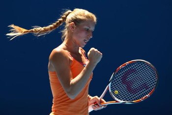 MELBOURNE, AUSTRALIA - JANUARY 24:  Alona Bondarenko of the Ukraine celebrates winning a point in her third round match against Svetlana Kuznetsova of Russia during day six of the 2009 Australian Open at Melbourne Park on January 24, 2009 in Melbourne, Au
