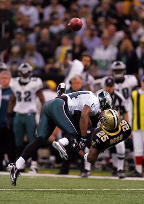 NEW ORLEANS - JANUARY 13:  Sheldon Brown #24 of the Philadelphia Eagles breaks up a pass intended for Reggie Bush #25 of the New Orleans Saints during the NFC divisional playoff game at the Superdome on January 13, 2007 in New Orleans, Louisiana.  (Photo 