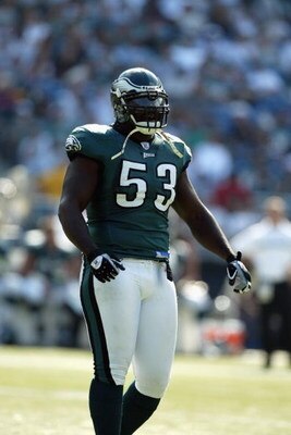 PHILADELPHIA - SEPTEMBER 29:  Defensive end Hugh Douglas #53 of the Philadelphia Eagles stands on the field during the NFL game against the Houston Texans on September 29, 2002 at Veterens Stadium in Philadelphia, Pennsylvania.  The Eagles won 35-17.  (Ph