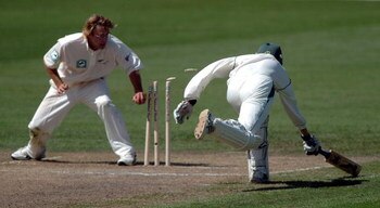 NEW ZEALAND - MARCH 11:  South Africa's Shaun Pollock is run out on 10 runs by New Zealand's Daniell Vettori on day two of the first cricket test played between New Zealand and South Africa at Westpac Park in Hamilton, New Zealand, Thursday, March 11th, 2