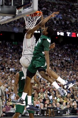 DETROIT - APRIL 04:  Durrell Summers #15 of the Michigan State Spartans dunks in the second half over Stanley Robinson #21 of the Connecticut Huskies during the National Semifinal game of the NCAA Division I Men's Basketball Championship at Ford Field on 