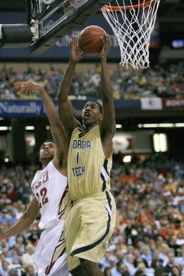 ATLANTA - MARCH 13: Iman Shumpert #1 of the Georgia Tech Yellow Jackets puts a shot up against the Florida State Seminoles during day two of the 2009 ACC Men's Basketball Tournament on March 13, 2009 at the Georgia Dome in Atlanta, Georgia.  (Photo by Kev