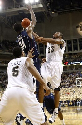 PITTSBURGH - MARCH 07:  Sam Young #14 of the Pittsburgh Panthers tries to get to the basket past Hasheem Thabeet #34 of the Connecticut Huskies on March 7, 2009 at the Petersen Events Center in Pittsburgh, Pennsylvania.  (Photo by Gregory Shamus/Getty Ima