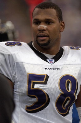 INDIANAPOLIS - OCTOBER 13: Linebacker Peter Boulware #58 of the Baltimore Ravens looks on against the Indianapolis Colts during their NFL game on October 13, 2002 at the RCA Dome in Indianapolis, Indiana. The Colts defeated the Ravens 22-20. (Photo by