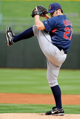SURPRISE, AZ - MARCH 03:  Pitcher Anthony Reyes #27 the Cleveland Indians warms up against the Kansas City Royals before the start of a spring training game against  at the Surprise Stadium on March 3, 2009 in Surprise, Arizona.  (Photo by Kevork Djansezi