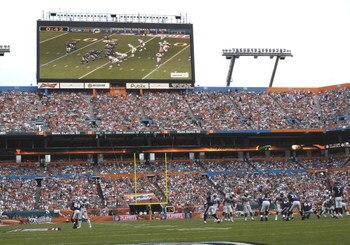 MIAMI, FL - JANUARY 4:  A large scoreboard shows play as the Miami Dolphins host the Baltimore Ravens in an NFL Wildcard Playoff Game at Dolphins Stadium on January 4, 2009 in Miami, Florida.  (Photo by Al Messerschmidt/Getty Images)