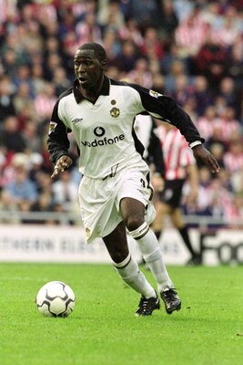 13 Oct 2001: Andy Cole of Manchester United runs with the ball during the FA Barclaycard Premiership match against Sunderland played at the Stadium of Light, in Sunderland, England. Manchester United won the match 3-1. Mandatory Credit: Stu Forster /Al