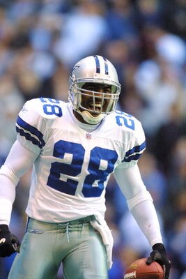 9 Dec 2001:  Safety Darren Woodson #28 of the Dallas Cowboys celebrates after making an interception against the New York Giants at Texas Stadium in Irving, Texas. The Cowboys won 20-13. DIGITAL IMAGE. Mandatory Credit: Ronald Martinez/ALLSPORT