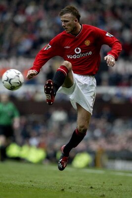 23 Mar 2002: David Beckham of Man Utd during the Manchester United v Middlesbrough FA Barclaycard Premiership match at Old Trafford, Manchester. DIGITAL IMAGE. Mandatory Credit: Laurence Griffiths/Getty Images
