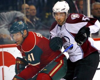 ST. PAUL, MN - APRIL 17:   Martin Skoula #41 of the Minnesota Wild and David Jones #54 of the Colorado Avalanche battle for position  during game five of the 2008 NHL Western Conference Quarterfinals on April 17, 2008 at the Xcel Energy Center in St. Paul