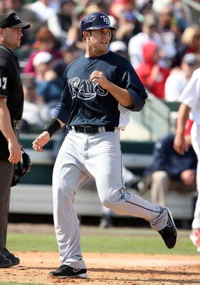 JUPITER, FL - MARCH 02:  Evan Longoria #3 of the Tampa Bay Rays scores a run against the St. Louis Cardinals during a spring training game at Roger Dean Stadium on March 2, 2009 in Jupiter, Florida. The Rays defeated the Cardinals 8-5.  (Photo by Doug Ben