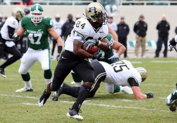 EAST LANSING, MI - NOVEMBER 08:  Kory Sheets #24 of the Purdue Boilermakers runs the ball against the Michigan State Spartans at Spartan Stadium on November 8, 2008 in East Lansing, Michigan.  (Photo by Jim McIsaac/Getty Images)