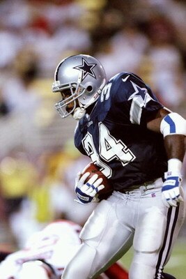 7 Sep 1997:  Kick returner Herschel Walker of the Dallas Cowboys runs down the field during a game against the Arizona Cardinals at Sun Devil Stadium in Tempe, Arizona.  The Cardinals won the game 25-22. Mandatory Credit: Brian Bahr  /Allsport