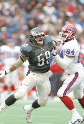 17 Nov 1996: Linebacker Mike Mamula #59 of the Philadelphia Eagles stares into the backfield as he battles with tight end Lonnie Johnson #84 of the Buffalo Bills while pursuing the football during a play in the Eagles 24-17 loss to the Bills at Veterans S