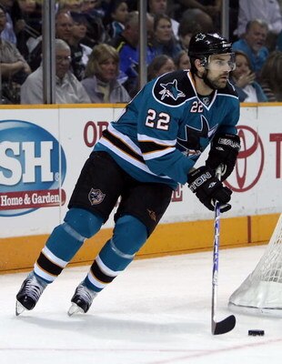 SAN JOSE, CA - OCTOBER 28:  Dan Boyle #22 of the San Jose Sharks skates with the puck during the NHL game against the Pittsburgh Penguins at HP Pavilion on October 28, 2008 in San Jose, California.  The Sharks defeated the Penguins 2-1.  (Photo by Christi