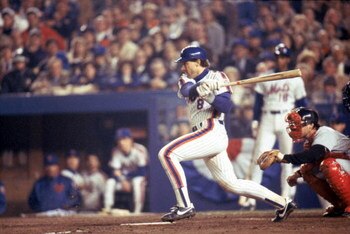 NEW YORK - 1986:  Gary Carter #8 of the New York Mets swings at the pitch during the 1986 World Series game against the Boston Red Sox at Shea Stadium on in New York City, New York. The Mets won 4-3. (Photo by Getty Images)