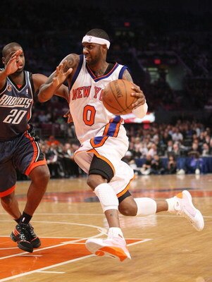 NEW YORK - MARCH 07:  Larry Hughes #0 of the New York Knicks drives to the basket against the Charlotte Bobcats on March 7, 2009 at Madison Square Garden in New York City. NOTE TO USER: User expressly acknowledges and agrees that, by downloading and or us