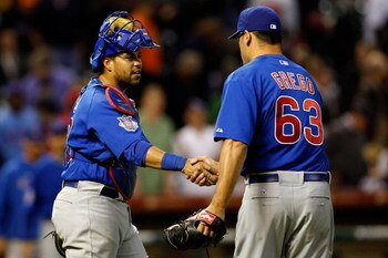 HOUSTON - APRIL 06:  Geovany Soto #18 congratulates Kevin Gregg #63 of the Chicago Cubs after defeating the Houston Astros 4-2 on Opening Day on April 6, 2009 at Minute Maid Park in Houston, Texas.  (Photo by Chris Graythen/Getty Images)