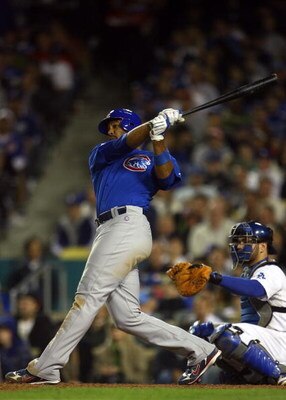 LOS ANGELES, CA - OCTOBER 04:  Derrek Lee #25 of the Chicago Cubs doubles to left in the eighth inning against the Los Angeles Dodgers in Game Three of the NLDS during the 2008 MLB playoffs on October 4, 2008 at Dodger Stadium in Los Angeles, California. 