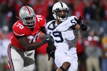 COLUMBUS, OH - OCTOBER 25: Offensive lineman Bryant Browning #70 of the Ohio State Buckeyes holds onto defensive lineman Aaron Maybin #59 of the Penn State Nittany Lions on October 25, 2008 at Ohio Stadium in Columbus, Ohio. No penalty was called on the p